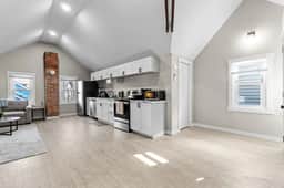 Gorg Wooden Beams w/Brick Accents in Downtown Apt - Image 3